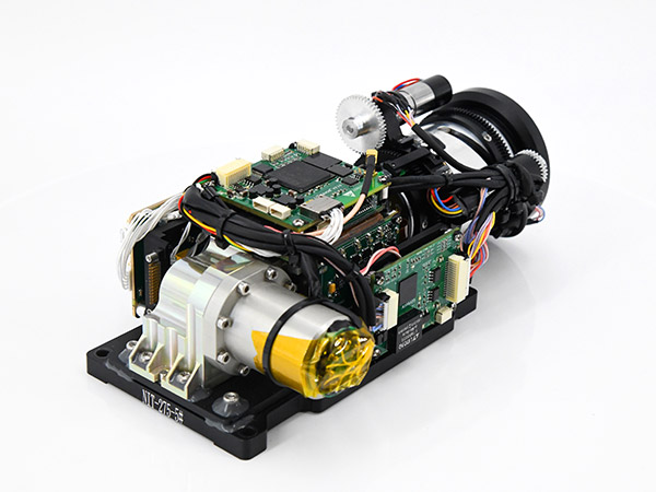 Cooled thermal module/core with lens