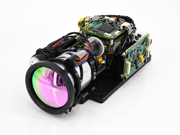 Cooled thermal module/core with lens