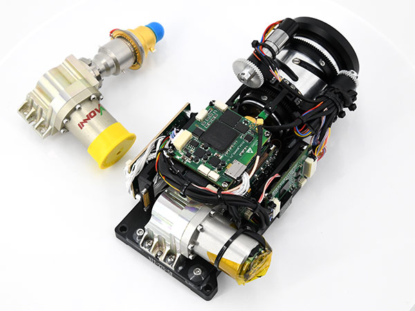 Cooled thermal module/core with lens