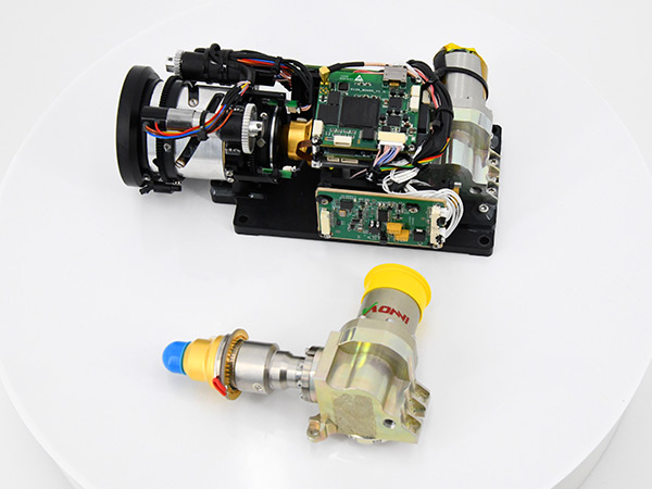 Cooled thermal module/core with lens
