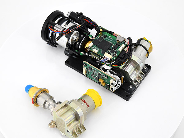 Cooled thermal module/core with lens