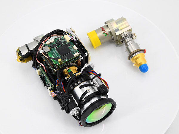 Cooled thermal module/core with lens